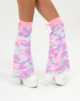 Pastel camouflage leg warmers worn by a person on a white background