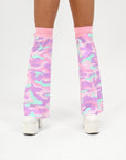 Pastel camouflage leg warmers worn with white shoes on a white background