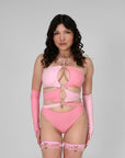 Pink infinity bodysuit rave outfit — strappy and metallic festival style perfect for EDC, Coachella, and summer EDM events.