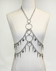 Spiked heart bodychain harness combining toughness and charm. A bold ravewear piece that transforms any outfit into a statement.