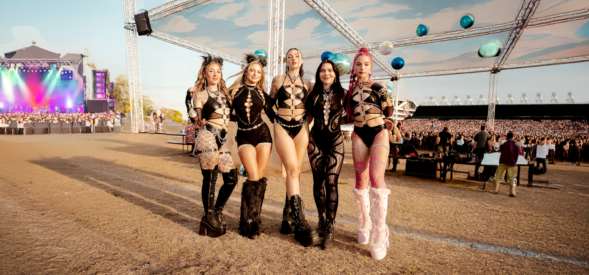 Suspex Rave Wear ambassadors rave wear designs at music festival.