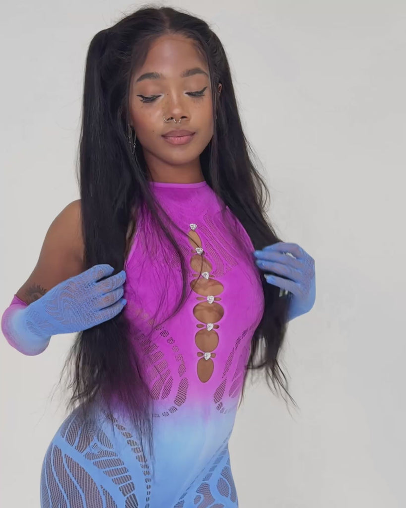 Close-up view of a gradient mesh jumpsuit with rhinestone details, highlighting fabric texture, stretch, and upper body fit.